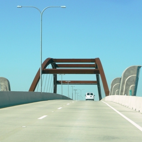 The Lewisville Lake Toll Bridge (LLTB) is a 1.7-mile-long toll bridge providing an east-west connection across Lewisville Lake in Denton County. The bridge connects Interstate 35E at Swisher Rd to the Dallas North Tollway at Eldorado Parkway. The LLTB opened on August 1, 2009.
